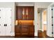 Custom wet bar with attractive cabinets at 4266 Paces Ferry Road Se, Atlanta, GA 30339