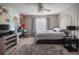 Bedroom with unique, colorful mural and patterned accent wall at 7522 Greens Mill Dr, Loganville, GA 30052