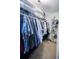 Walk-in closet with shelving and ample hanging space at 7522 Greens Mill Dr, Loganville, GA 30052