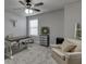 Study area that has a desk, comfortable chair, and plenty of natural light at 110 Legion Dr, Buford, GA 30518