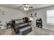 Bedroom with plenty of space, comfortable bed, and decor at 110 Legion Dr, Buford, GA 30518