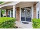 Charming home featuring a welcoming entryway with double doors and stone accents at 203 Setters Rdg, Canton, GA 30115
