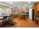 Modern kitchen features granite countertops, stainless steel appliances, and a breakfast nook at 203 Setters Rdg, Canton, GA 30115