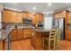 Spacious kitchen featuring granite countertops, stainless steel appliances, and wood cabinets at 203 Setters Rdg, Canton, GA 30115