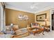 Cozy living room showcasing a decorative fireplace and comfortable seating arrangement at 203 Setters Rdg, Canton, GA 30115