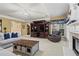 Comfortable living room with fireplace, built-in shelving, and a plush recliner at 203 Setters Rdg, Canton, GA 30115