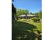 Spacious back yard with a covered patio at 2126 Monterey Dr, Snellville, GA 30039