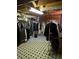 Finished basement with storage and checkered tile floor providing ample space at 2126 Monterey Dr, Snellville, GA 30039