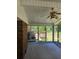Light-filled sunroom with backyard access, providing an inviting space for relaxation and entertainment at 2126 Monterey Dr, Snellville, GA 30039