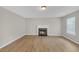 Cozy living room with hardwood floors and a fireplace at 2640 Thunder Basin Way, Douglasville, GA 30135