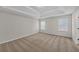 Large primary bedroom with trey ceiling and carpet at 2640 Thunder Basin Way, Douglasville, GA 30135