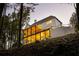 Home exterior featuring multiple decks with fans, railing, and wooded surroundings at 3290 Dunlop Ne Ct, Atlanta, GA 30319