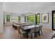 Open-concept kitchen and dining area with a large island and abundant natural light at 3290 Dunlop Ne Ct, Atlanta, GA 30319