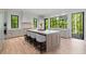 Spacious kitchen featuring a large island, modern appliances, and elegant finishes at 3290 Dunlop Ne Ct, Atlanta, GA 30319
