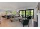 Inviting living room with hardwood floors, fireplace, and seamless indoor-outdoor flow at 3290 Dunlop Ne Ct, Atlanta, GA 30319