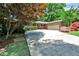 Charming brick ranch with well-maintained landscaping and a wide driveway leading to the two-car garage at 1280 Berkeley Rd, Avondale Estates, GA 30002