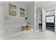 Relaxing bathroom boasts a soaking tub, modern fixtures, and ample counter space at 2154 Windstream Sw Way, Marietta, GA 30060