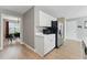 Bright kitchen area with stainless steel appliances and white cabinetry at 2154 Windstream Sw Way, Marietta, GA 30060