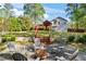 Backyard view featuring a fire pit area and the back of the home at 363 Ridge Run Dr, Hiram, GA 30141