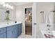 Stylish bathroom with glass sink and a view into the main bedroom at 363 Ridge Run Dr, Hiram, GA 30141