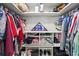 Organized walk-in closet with shelving and ample storage space for clothing at 363 Ridge Run Dr, Hiram, GA 30141