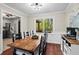 Dining room with a large window is ideal for formal dinners and casual Gathering gatherings and is adjacent to kitchen at 363 Ridge Run Dr, Hiram, GA 30141