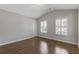 Bedroom featuring two windows and neutral paint at 3715 Lexington Rd, Tucker, GA 30084