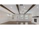 Spacious living room features wood beams, fireplace, and wainscoting at 3715 Lexington Rd, Tucker, GA 30084
