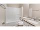 Bathroom featuring a shower-tub combo and granite countertop at 464 Meadowbrook Dr, Mcdonough, GA 30253