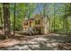 This home offers inviting curb appeal with a classic design, porch, and a convenient driveway at 464 Meadowbrook Dr, Mcdonough, GA 30253