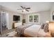 Main bedroom with a ceiling fan and walk-in closet at 464 Meadowbrook Dr, Mcdonough, GA 30253