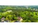 Desirable property showcasing beautiful landscaping and an ideal, private location amid mature trees at 51 Sagemont Ct, Acworth, GA 30101