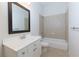 Bathroom featuring vanity with white countertop and tiled shower-tub combo at 51 Sagemont Ct, Acworth, GA 30101