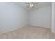 Neutral carpeted bedroom with ceiling fan and ample natural light at 51 Sagemont Ct, Acworth, GA 30101