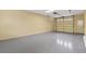 Spacious garage with painted floor and automatic door; plenty of space for storage and vehicles at 51 Sagemont Ct, Acworth, GA 30101