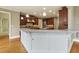 Modern kitchen featuring stainless steel appliances, granite countertops, and hardwood flooring at 51 Sagemont Ct, Acworth, GA 30101