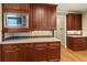 Elegant kitchen features stainless steel appliances, granite countertops and hardwood floors at 51 Sagemont Ct, Acworth, GA 30101
