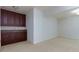 Living room features a wet bar and carpet throughout at 51 Sagemont Ct, Acworth, GA 30101
