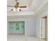 Bright main bedroom with trey ceilings, adjoining sunroom, and light neutral walls at 51 Sagemont Ct, Acworth, GA 30101