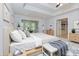 Beautiful main bedroom with tray ceilings, neutral walls, and hardwood floors at 51 Sagemont Ct, Acworth, GA 30101