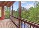 Relaxing screened porch with wood floors and view of a pool at 51 Sagemont Ct, Acworth, GA 30101