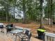 Large backyard with deck and shed at 4561 N Woodlake Se Ln, Conyers, GA 30013