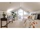Inviting bedroom with vaulted ceilings, decorative accents, and a comfortable sitting area at 1362 Briarcliff Ne Rd, Atlanta, GA 30306
