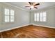 Charming bedroom with hardwood floors features shuttered windows and ceiling fan that add character at 1362 Briarcliff Ne Rd, Atlanta, GA 30306