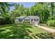 Charming home featuring a well-maintained lawn, lovely landscaping, and a welcoming entrance at 1362 Briarcliff Ne Rd, Atlanta, GA 30306