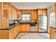 Lovely kitchen with ample counter space, wood cabinets, stainless steel appliances and tile floor at 1362 Briarcliff Ne Rd, Atlanta, GA 30306