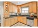 Well-appointed kitchen featuring stainless appliances, wood cabinets and solid surface countertops at 1362 Briarcliff Ne Rd, Atlanta, GA 30306
