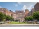 The Ponce City Market building featuring a rooftop terrace and surrounding green space at 1362 Briarcliff Ne Rd, Atlanta, GA 30306