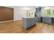 Bright kitchen featuring granite countertops, stainless appliances, and stylish gray cabinetry at 2663 Lowell Dr, Morrow, GA 30260