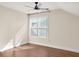 Bedroom with hardwood floors and ceiling fan at 4343 Ainsley Mill Ln, Duluth, GA 30097